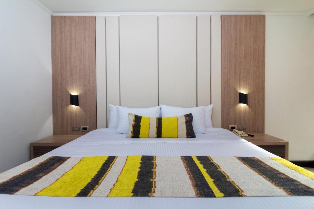 Hotel Dann Carlton Belfort Medellin Bagian luar foto A bedroom at the hotel