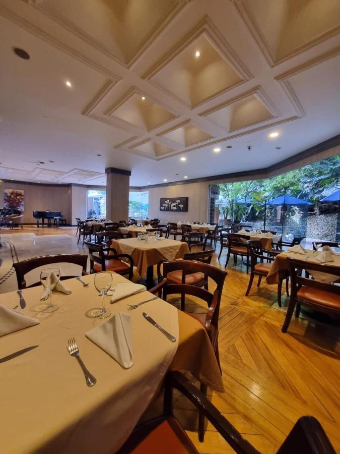 Hotel Dann Carlton Belfort Medellin Bagian luar foto The restaurant