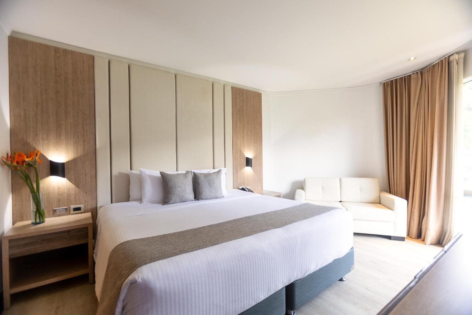 Hotel Dann Carlton Belfort Medellin Bagian luar foto A bedroom at the hotel