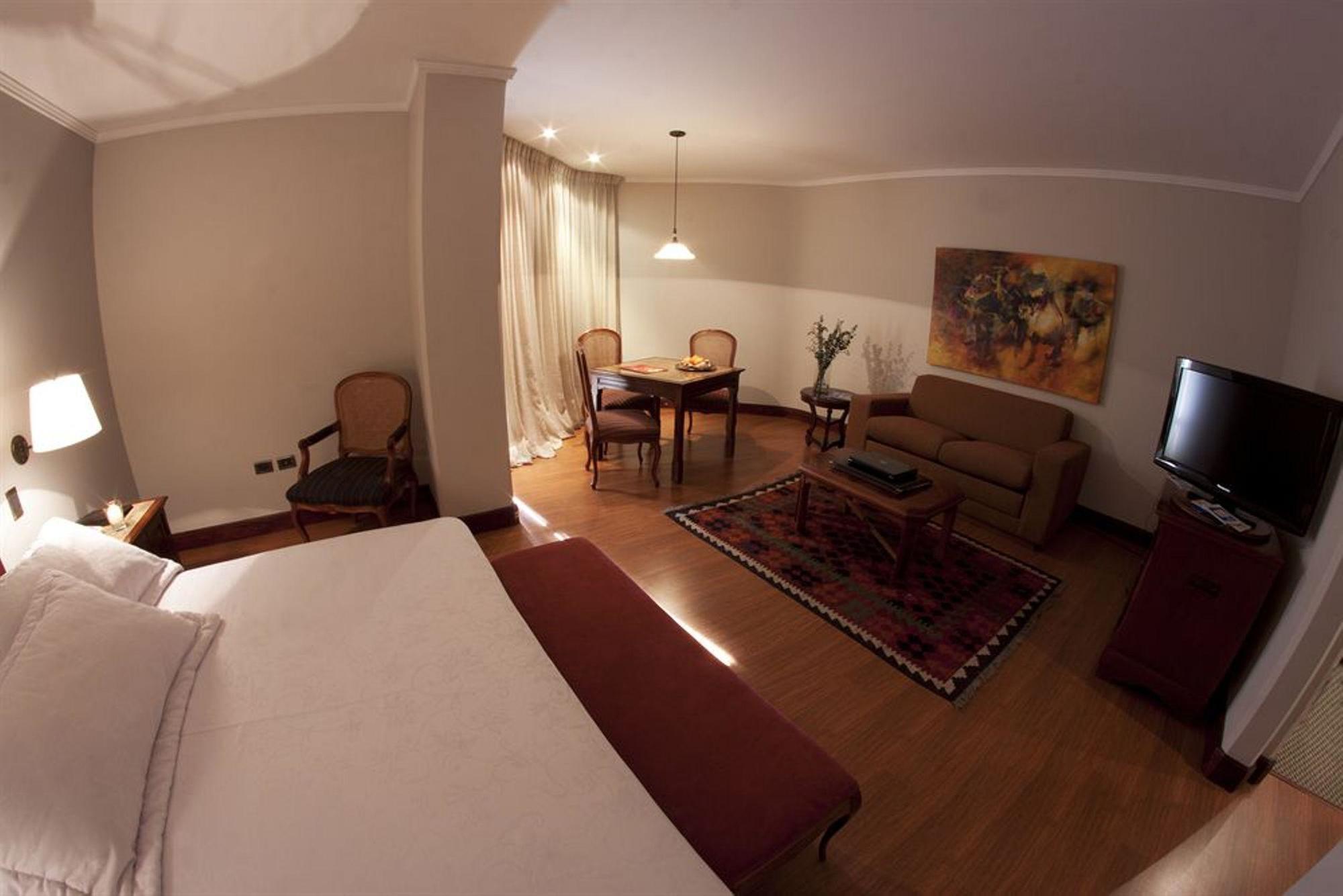 Hotel Dann Carlton Belfort Medellin Bagian luar foto A room at the hotel
